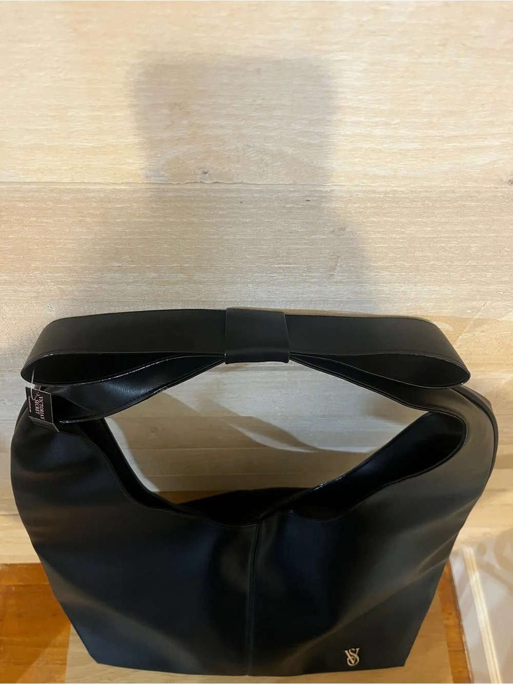 Victoria's Secret Black Leather Shoulder Hobo with Gold Logo Bow Strap